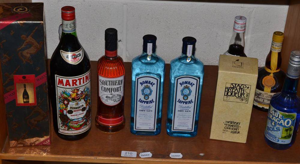 Lot 210 - Mixed spirits comprising 'Bombay Sapphire' gin (x2), Southern Comfort, Stags Breath gin, Pimms,...