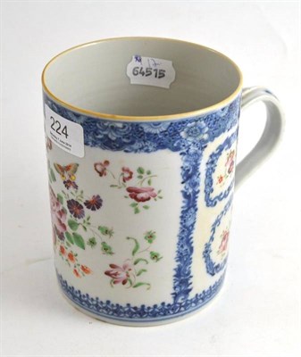 Lot 224 - Chinese polychrome painted tankard decorated with flowers