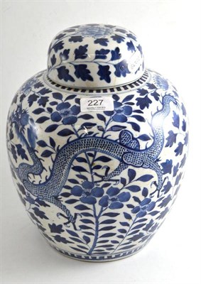 Lot 227 - A 19th century Chinese blue and white porcelain ginger jar and cover decorated with four claw...