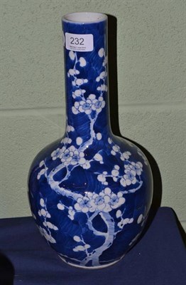 Lot 232 - A 19th century Chinese porcelain bottle vase decorated with flowering prunus blossom, bears...