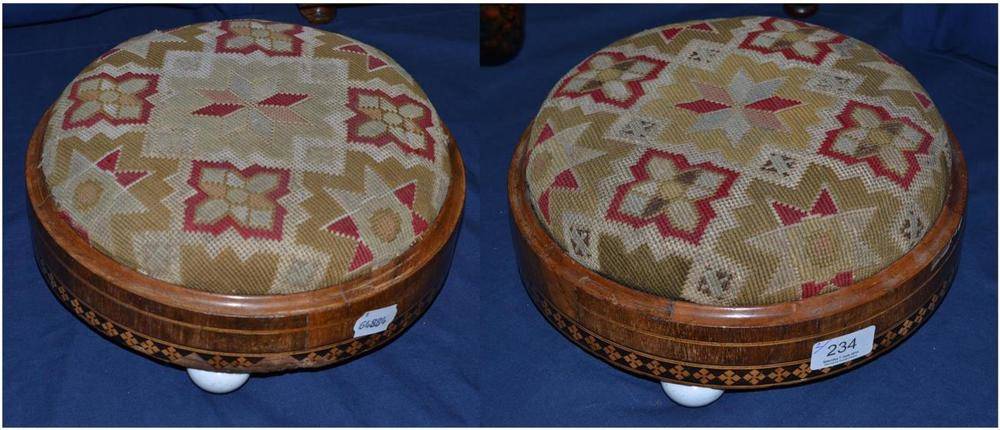Lot 234 - A pair of Victorian walnut footstools