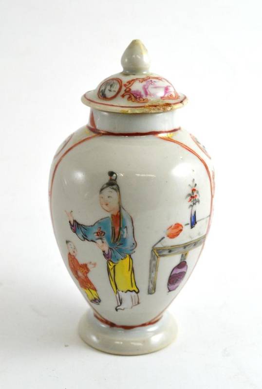 Lot 242 - Small famille rose enamel vase decorated with figures (cover chipped)
