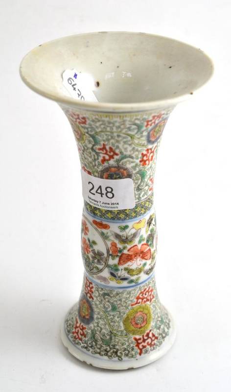 Lot 248 - A 19th century Chinese porcelain trumpet vase decorated in famille verte enamels with flowers...