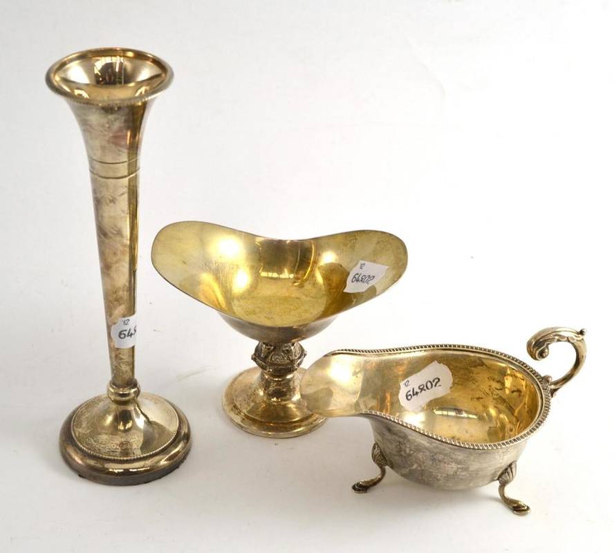 Lot 249 - A silver pedestal dish, silver sauceboat and silver specimen vase