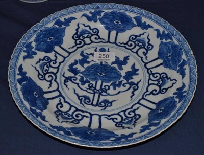 Lot 250 - Chinese blue and white dish decorated with flower heads