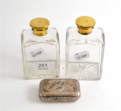 Lot 251 - Pair of Victorian glass scent bottles with silver gilt tops and a Continental silver snuff box with