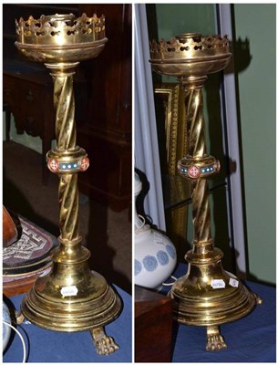 Lot 270 - Pair of brass ecclesiastical style large candlesticks with painted decoration