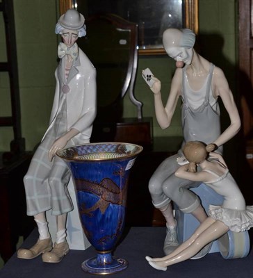 Lot 275 - Two Lladro clown groups and a Wedgwood vase (3)