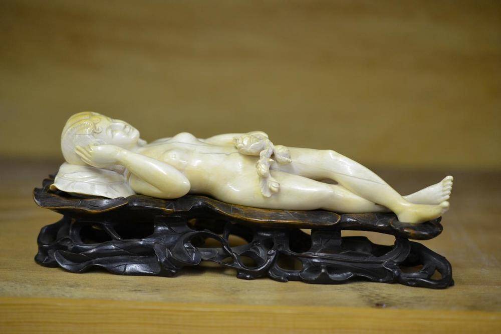 Lot 173 - A Chinese Carved Export Ivory Doctor's Medical Figure, circa 1930, as a nude young woman...