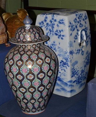 Lot 277 - Blue and white pottery garden seat and a floral-decorated baluster vase and cover
