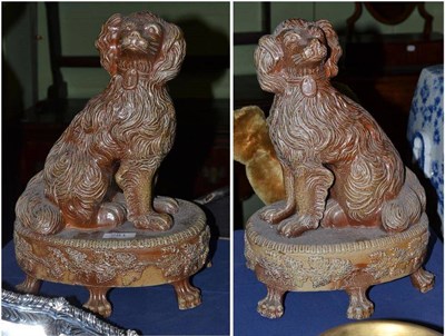 Lot 281 - A pair of modern seated spaniels