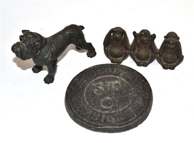 Lot 289 - A bronze figure of a bull dog, a lead flat weight and a bronze figure group of the three Wise...