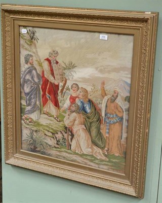 Lot 358 - A Victorian woolwork picture of Moses bringing home the Ten Commandments