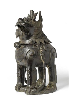 Lot 181 - A Chinese Bronze Kylin Incense Burner, Qing Dynasty, 18th/19th century, standing with well detailed