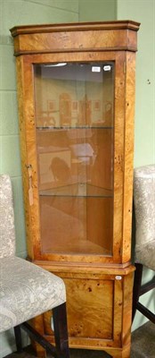 Lot 372 - Tall glazed front corner unit in pippy maple