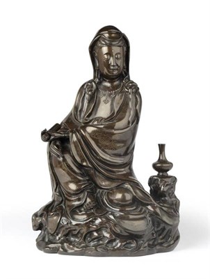 Lot 182 - A Chinese Silver Inlaid Bronze Figure of Guanyin, signed Yutang Shisou, Qing Dynasty, the...