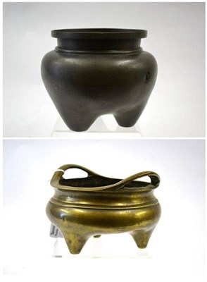 Lot 183 - A Chinese Bronze Censer, bears Xuande reign mark, of circular form with loop handles on three feet