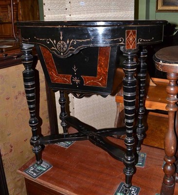 Lot 395 - Victorian ebonised inlaid sewing table