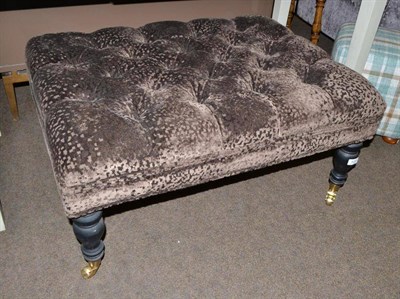 Lot 423 - Upholstered footstool in Zoffany dark chocolate fabric and black legs