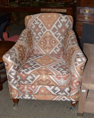 Lot 428 - Occasional chair in rustic Linwood fabric with castors to the front