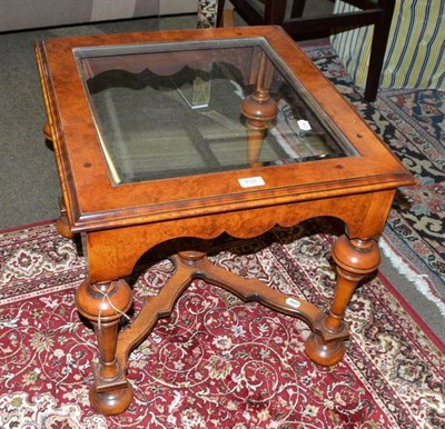 Lot 438 - Reproduction glass top side table on stretcher base