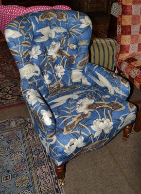 Lot 440 - Occasional chair in blue floral fabric by GP & J Baker