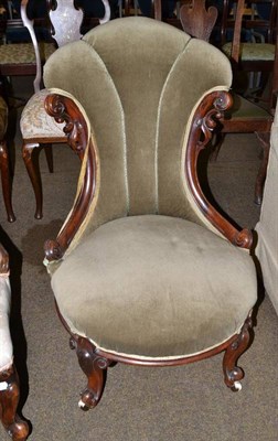 Lot 453 - A rosewood framed nursing chair with green velvet upholstery
