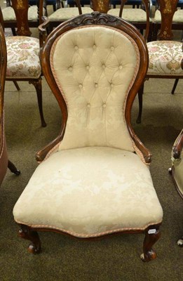 Lot 454 - A Victorian walnut button back nursing chair