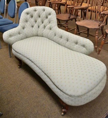 Lot 459 - A Victorian chaise with teal blue buttoned upholstery and carved scroll feet