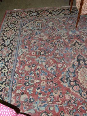 Lot 463 - A Mahal carpet, West Persia, the faded rose pink field with central medallion framed by...
