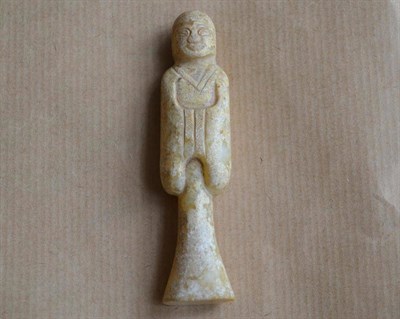 Lot 191 - A Small Chinese Jade Figure of a Man with Long Hair, Western Han (206BC-9AD), in pale celadon...