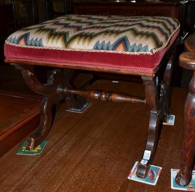 Lot 473 - A Victorian x-framed stool with over-stuffed woolwork seat