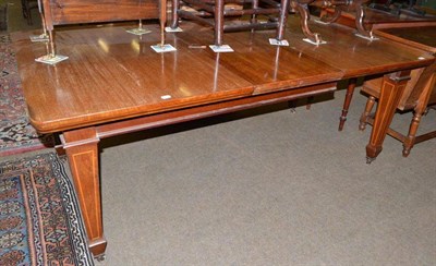 Lot 476 - Edwardian mahogany extending dining table