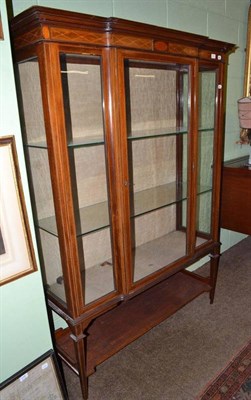 Lot 519 - An Edwardian mahogany inlaid display cabinet, with breakfront moulded cornice above a central...