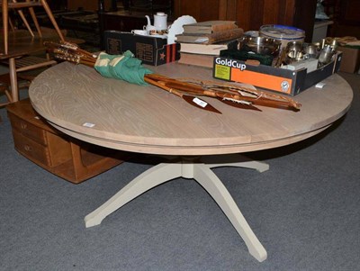Lot 546 - Neptune circular dining table, to seat 6-8, in American light oak with cream painted leg