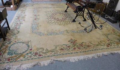 Lot 571 - Large cream ground carpet from a country house in Kirkby Lonsdale