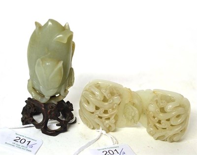 Lot 201 - A Chinese Jade Belt Buckle, circa 1900 or earlier, in two parts, each of shaped oval form, open...