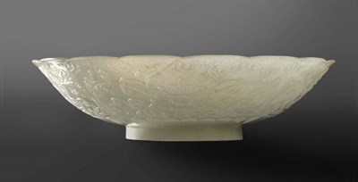 Lot 202 - A Chinese White Jade Bowl, 18th/19th century, of ogee outline and with gently lobed rim, externally