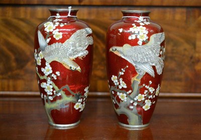 Lot 204 - A Pair of Japanese Enamel Baluster Vases, early 20th century, decorated in colours with eagles...