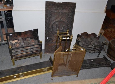 Lot 620 - Brass fender, fire guard and a square stick stand, two iron grates, cast iron fire back, a...