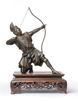 Lot 207 - A Japanese Bronze Figure of a Samurai Bowman, Meiji period (1868-1912), half kneeling and...