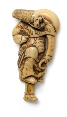 Lot 209 - A Japanese Carved Ivory Netsuke as a Sage, 18th/19th century, standing with one leg raised and...