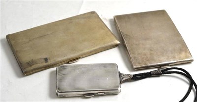 Lot 24 - Two silver cigarette cases and a silver compact