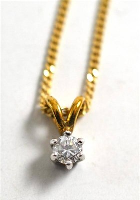 Lot 25 - A diamond solitaire pendant on a 9ct gold curb chain