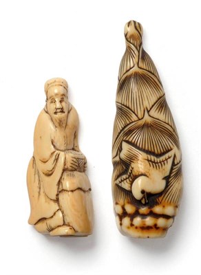 Lot 211 - A Japanese Ivory Netsuke as a Chidori on a Vegetable Bud, late Meiji period (1868-1912),...