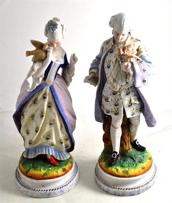 Lot 63 - A pair of bisque porcelain figures of a gallant and a lady
