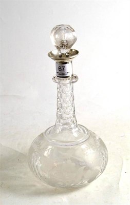 Lot 67 - A Victorian cut and etched glass decanter with a silver collar