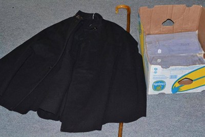 Lot 88 - A Police cape and a quantity of chrome numerals and insignia, two unused Police shirts, a shepherds
