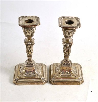 Lot 103 - A pair of loaded silver candlesticks, Sheffield 1902
