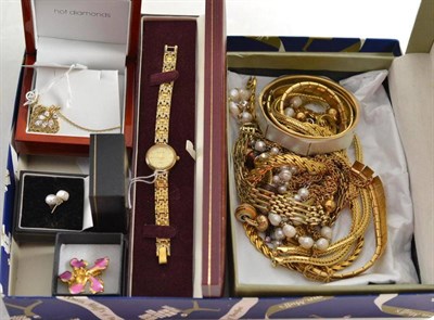 Lot 121 - A quantity of costume and gilt jewellery including a Tissot Quartz watch